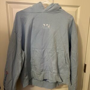 Light Blue Hoodie with Sun Design